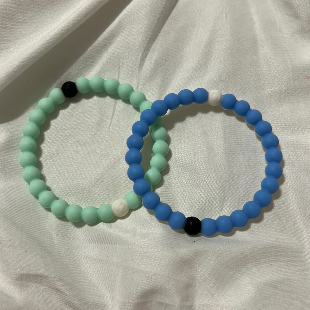 2 Lokai Bracelets